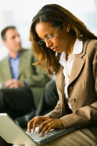 Biz woman using laptop